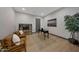 Office space features hard wood floors, a modern black desk and leather chairs at 4098 N Golf Dr, Buckeye, AZ 85396
