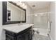 Bathroom features elegant vanity, large mirror, and shower-tub combination at 7401 N Scottsdale Rd # 24, Paradise Valley, AZ 85253