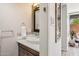 Bathroom features a white vessel sink, decorative backsplash, and designer accents at 7401 N Scottsdale Rd # 24, Paradise Valley, AZ 85253