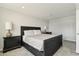 Bedroom offers a spacious layout with a black bed frame and neutral decor at 7401 N Scottsdale Rd # 24, Paradise Valley, AZ 85253