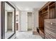Walk-in closet with custom shelving, built-in drawers, and ample storage space at 7401 N Scottsdale Rd # 24, Paradise Valley, AZ 85253
