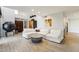 Bright, modern living room with wood-look tile floors, stylish seating, and unique decor at 7401 N Scottsdale Rd # 24, Paradise Valley, AZ 85253
