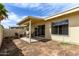 Home's backyard featuring a covered patio area, providing a relaxing outdoor space at 747 W Rice Dr, Tempe, AZ 85283