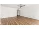 Open living area with wood floors, ceiling fan, and neutral tones, providing a blank canvas at 747 W Rice Dr, Tempe, AZ 85283
