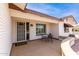 Inviting front porch with seating area, perfect for relaxing and enjoying the outdoors at 8011 E Milagro Ave, Mesa, AZ 85209