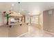 Bright eat-in kitchen with granite countertops, stainless steel appliances and tile flooring at 8011 E Milagro Ave, Mesa, AZ 85209