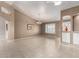 Large living space with tile floors, recessed lighting, and ample natural light at 8011 E Milagro Ave, Mesa, AZ 85209