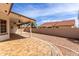Covered patio offers shade and a retreat with scenic backyard views, and tile flooring at 8011 E Milagro Ave, Mesa, AZ 85209