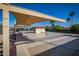 Community shuffleboard with shaded seating and meticulously maintained shuffleboard courts at 8011 E Milagro Ave, Mesa, AZ 85209