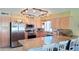 Stylish kitchen with updated appliances, a large island perfect for seating, and plenty of natural light at 8020 E Keats Ave # 279, Mesa, AZ 85209