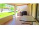 A shaded patio with grill and furniture, offers an inviting space for relaxation and outdoor enjoyment at 8020 E Keats Ave # 279, Mesa, AZ 85209