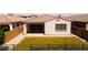 The backyard features rock ground covering with privacy fence at 9229 W Willow Bend Ln, Phoenix, AZ 85037