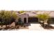 This inviting home has a well-kept yard and landscaping that frames a comfortable and appealing curb presence at 9229 W Willow Bend Ln, Phoenix, AZ 85037