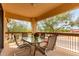 Outdoor patio with table and four chairs offering relaxing seating area at 9253 N Firebrick Dr # 206, Fountain Hills, AZ 85268
