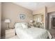 Bedroom with mirrored closet doors and relaxing decor and carpet flooring at 9253 N Firebrick Dr # 206, Fountain Hills, AZ 85268