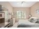Cozy bedroom with neutral walls, carpet flooring, and a large window at 9253 N Firebrick Dr # 206, Fountain Hills, AZ 85268