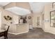 Open concept common area with small kitchen and dining area at 9253 N Firebrick Dr # 206, Fountain Hills, AZ 85268