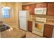 Well-equipped kitchen boasts modern appliances, ample storage, and seamless flow to the dining area at 930 N Mesa Dr # 2027, Mesa, AZ 85201