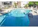 Sparkling community pool with multiple entry points and lounge seating provides a relaxing atmosphere at 930 N Mesa Dr # 2027, Mesa, AZ 85201