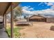 View of a spacious backyard with trampoline from the covered patio at 10723 N 80Th Ln, Peoria, AZ 85345