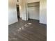 Cozy bedroom with fresh white paint and wood flooring at 120 N Jackson St, Chandler, AZ 85225