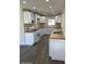 Modern kitchen featuring white cabinets, wooden countertops, and stainless steel appliances at 120 N Jackson St, Chandler, AZ 85225