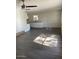 Bright living room with wood flooring, and a ceiling fan at 120 N Jackson St, Chandler, AZ 85225
