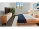 Cozy bedroom with a plush rug and modern furniture, offering a comfortable retreat at 13481 W Buckskin Trl, Peoria, AZ 85383