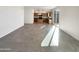 Open concept kitchen with maple cabinets and tiled floors at 13481 W Buckskin Trl, Peoria, AZ 85383