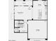 Open-concept floor plan featuring a kitchen, great room, powder room, garage, and porch at 14596 W Sand Hills Rd, Surprise, AZ 85387
