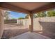 Large backyard featuring low maintenance landscaping, patio, and privacy fence at 1541 W Lynne Ln, Phoenix, AZ 85041