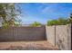 Backyard featuring desert landscaping, a privacy wall, and mountain views at 1541 W Lynne Ln, Phoenix, AZ 85041