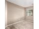 Bedroom with neutral walls, tile flooring, and window providing natural light at 1541 W Lynne Ln, Phoenix, AZ 85041
