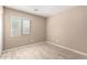 Bedroom with horizontal blinds, neutral walls, and tile flooring; bathed in natural light at 1541 W Lynne Ln, Phoenix, AZ 85041