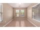 Bright dining area featuring tile floors and lots of natural light from three large windows at 1541 W Lynne Ln, Phoenix, AZ 85041