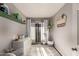 Well-lit room with sliding glass doors, built-in shelves, and a playful national park decor at 1645 W Baseline Rd # 2176, Mesa, AZ 85202