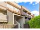Charming building exterior with stairs, walkway and desert landscaping at 1645 W Baseline Rd # 2176, Mesa, AZ 85202