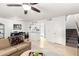 Open floor plan with living room and dining area leading to a well-equipped kitchen at 1645 W Baseline Rd # 2176, Mesa, AZ 85202