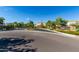 Community entrance featuring a gated entry and lush landscaping welcoming residents and guests at 17160 N 9Th Pl, Phoenix, AZ 85022