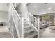 Bright entryway with carpeted stairs leads to open-concept living space with tile floors at 17160 N 9Th Pl, Phoenix, AZ 85022