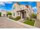 Inviting two-story home with a covered porch and well-maintained landscaping at 17160 N 9Th Pl, Phoenix, AZ 85022
