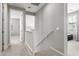 Neutral hallway with carpet and white trim at 17160 N 9Th Pl, Phoenix, AZ 85022