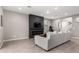 Comfortable living room with a stylish fireplace and a neutral color palette at 17160 N 9Th Pl, Phoenix, AZ 85022