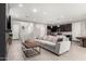 Spacious living area showcasing the open floor plan and staircase to the second floor at 17160 N 9Th Pl, Phoenix, AZ 85022