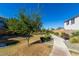 Serene community park featuring a walking path, landscaping, and a bench for enjoying the outdoors at 17160 N 9Th Pl, Phoenix, AZ 85022