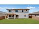 Spacious backyard with lush lawn is perfect for outdoor activities and entertaining at 17827 W Medlock Dr, Litchfield Park, AZ 85340