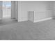 Bedroom upstairs has carpet and doors at 17827 W Medlock Dr, Litchfield Park, AZ 85340