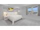 Bright bedroom with large windows, neutral decor, and a comfortable queen-sized bed at 17827 W Medlock Dr, Litchfield Park, AZ 85340