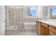 Bathroom featuring a shower, a bathtub, and modern finishes at 17841 W Windsor Blvd, Litchfield Park, AZ 85340