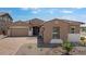Charming single-story home with a two-car garage, complemented by a well-maintained yard and inviting curb appeal at 17841 W Windsor Blvd, Litchfield Park, AZ 85340